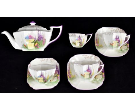 SHELLEY; an eight piece tea for two service in the Regent shape decorated in the 'Garden Urn' pattern comprising teapot, milk