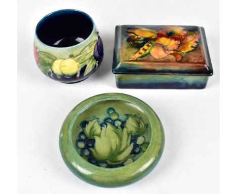WALTER MOORCROFT; three pieces comprising a rectangular lidded trinket box in the Orchid pattern on a flambé ground, length 1