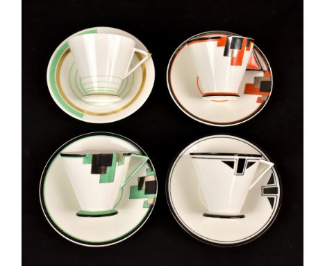 SHELLEY; a Mode teacup and saucer in the 'Orange Blocks' pattern no.11786, together with three further teacups and saucers in