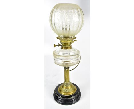 A late 19th century oil lamp with clear glass reservoir and frosted glass shade, height 56cm (converted).Additional Informati