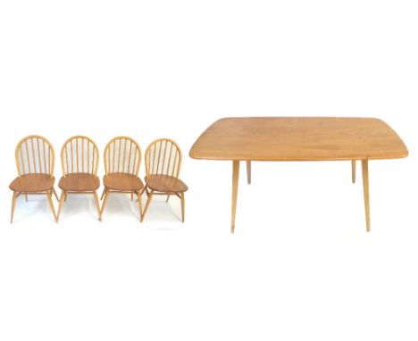 ERCOL; a light elm five piece dining suite comprising refectory table, height 71cm, length 152cm, width 76cm, and four spindl