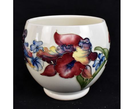 MOORCROFT; an Orchid pattern cream ground planter of ovoid form, impressed marks and signed to base, height 13.5cm, diameter 