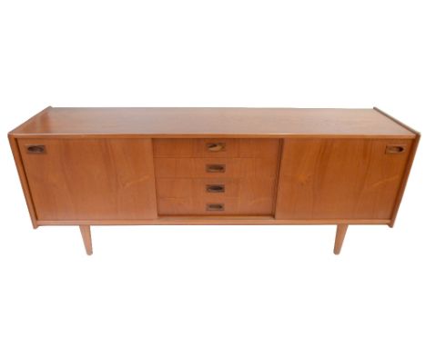 A mid-century stained teak sideboard with two sliding doors flanking four central drawers, raised on column supports, height 