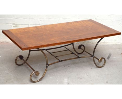 A contemporary mahogany coffee table, raised on metal frame, height 44cm, length 121cm, width 61cm.Additional InformationLigh