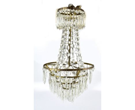 A gilt metal crystal drop ceiling light, length approx 50cm.Additional InformationHeavy rubbing to to gilding of the metal, f