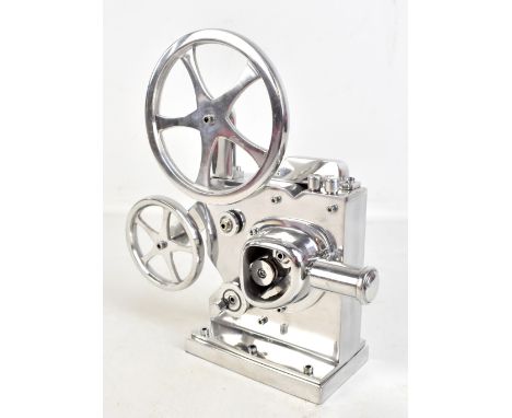 A modern polished aluminium model of a cine reel projector, height 29.5cm.
Additional InformationMinor surface scratches, bas