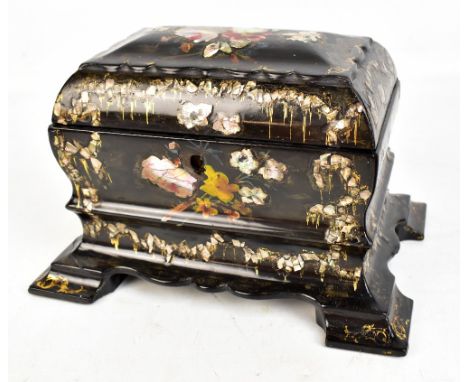 A Victorian papier-mâché gilt heightened and mother of pearl inlaid two division tea caddy of bombé form raised on exaggerate
