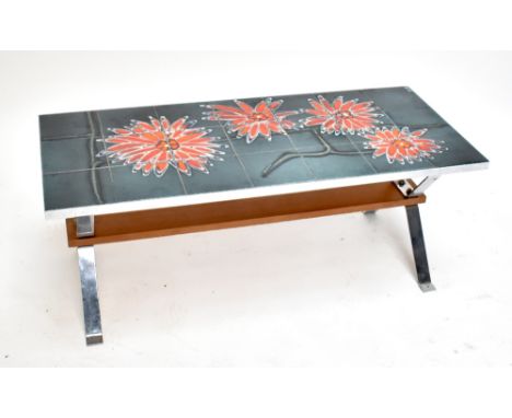 A 1960s/70s chrome framed floral decorated tile topped table, length 109cm.Additional InformationSome light surface scratches