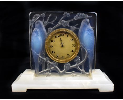 RENÉ LALIQUE (FRENCH, 1860-1945); a pre-war 'Inseparables' eight day desk clock in clear and opalescent glass, press moulded 