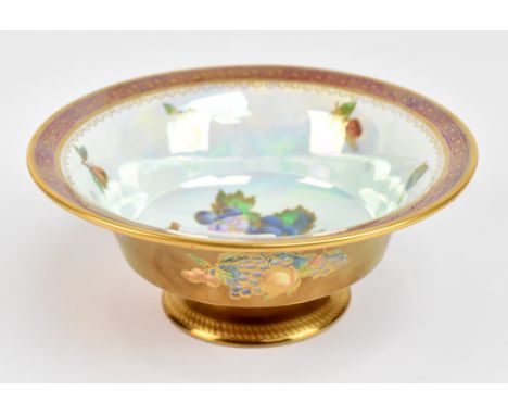 WEDGWOOD; a pedestal lustre bowl decorated with fruit inside a geometric border, factory marks and numbered Z5458 to base, he
