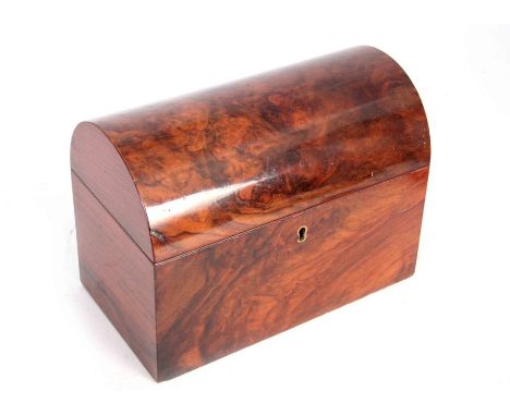 A 19TH CENTURY DOMED TOP FIGURED WALNUT TEA CADDY with a hinged lid revealing two lidded compartments 22.5cm wide 17cm high. 