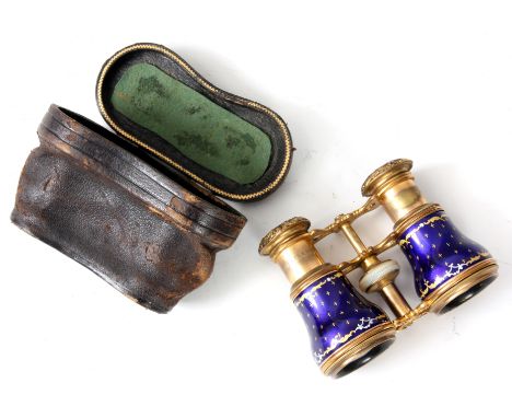 FLAMMARION
A PAIR OF ORMOLU AND BLUE ENAMEL OPERA GLASSES with cast leaf work decoration to the eyepieces, the bodies painted