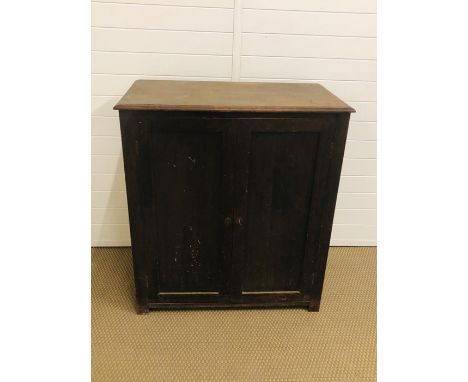 An oak topped low cupboard with internal shelf (H90cm W82cm D45cm W82cm)