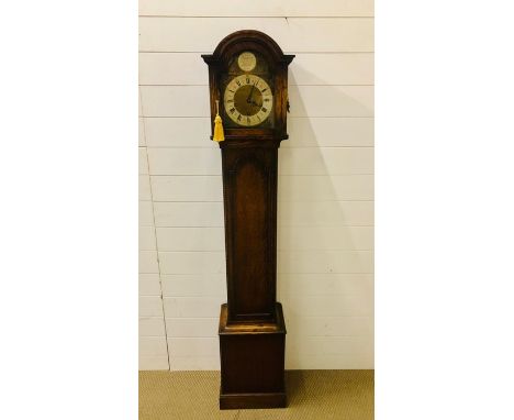 A mahogany Grandmother clock with original keys bearing the inscription "Tempus Fugit", (Time Flies)