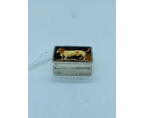 A silver and enamel set pill box with dog pictorial image 