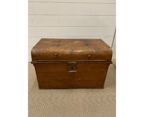 A Military metal trunk with stud work on top