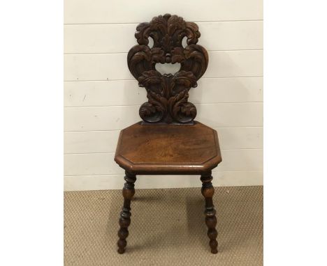 A late Victorian hall chair with bobbin turned legs 
