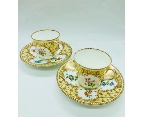 A pair of Royal Worcester teacups and saucers 