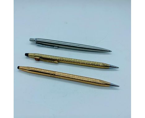 A Cross pen and pencil and one Parker pen 