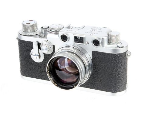 A Leica IIIf Red Dial Delay Rangefinder Camera, 1956, chrome, serial no. 792821, with Leitz Summitar f/2 50mm lens, 1951, chr