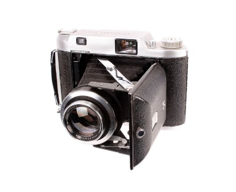 A Ross Ensign Autorange 820 Rangefinder Camera, serial no. 10610, with Ross Xpres f/3.8 105mm lens, serial no. 75695, body, G