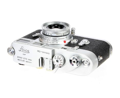 A Leica M3 Rangefinder Camera, 1959, type III, serial no. 974843, with Leitz Elmar f/2.8 50mm lens, 1960, chrome, serial no. 