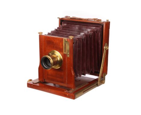 A Talbot & Eamer Mahogany Field Camera, 4½x6¼, with unmarked f/8 brass lens, body, G-VG, lens, VG, some light cleaning marks,