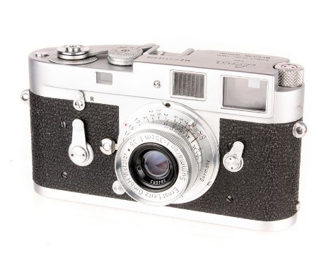 A Leica M3 Rangefinder Camera, 1965, chrome, serial no. 1112206, with Leitz Summaron f/3.5 35mm lens, 1951, SM in M adapter, 