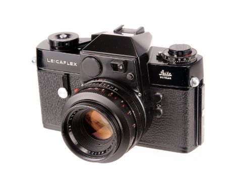 A Leicaflex SLR Camera, black, serial no. 1084260, with Leitz Summicron-R f/2 50mm lens, black, serial no. 1999934, body, G, 