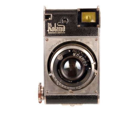 A Roland Camera, serial no. W198, with Dr. P Rudolph Kleinbild-Plasmat f/2.7 70mm lens, serial no. 572222, body, F, some sign