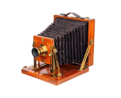 An Unmarked Mahogany Field Camera, with rear swing movements, 4½x6¼, with Busch’s Rapid Aplanat No.2 f/8 8” brass lens, body,