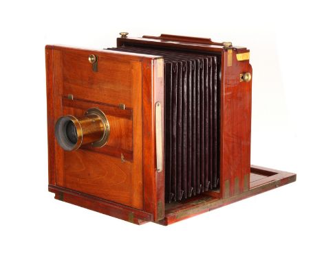 A Fine J. H. Dallmeyer Mahogany Wet Plate Camera, serial no. 1975, with aperture at the front suitable for stereo lens board,