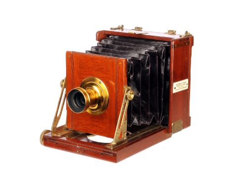 A Sharman D. Neill Mahogany Field Camera, 3x4”, with R. J. Beck Rectilinear 5” Waterhouse-stop brass lens, serial no. 1601, b