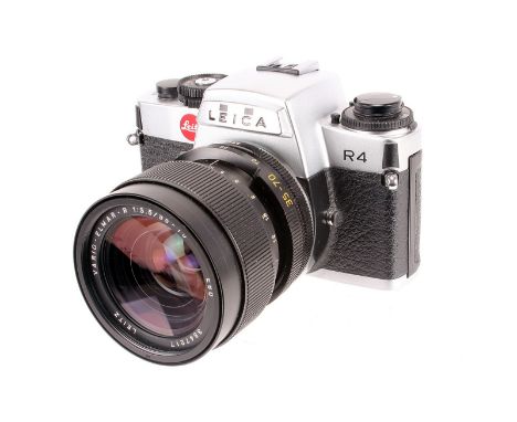 A Leica R4 SLR Camera, chrome, serial no. 1618184, with Leitz Vario-Elmar-R f/3.5 35-70mm lens, black, serial no. 3347217, bo