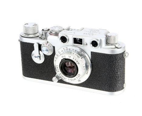 A Leica IIIf Red Dial Delay Rangefinder Camera, 1954, chrome, serial no. 687324, with Leitz Elmar f/3.5 50mm lens, 1952, chro