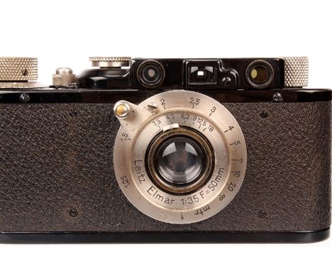 A Leica II Rangefinder Camera, 1932, black, serial no. 84039, with Leitz Elmar f/3.5 50mm lens, 1932, nickel, serial no. 1262