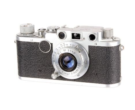 A Leica IIf Rangefinder Camera, 1951, chrome, serial no. 451684, with Leitz Elmar f/3.5 50mm lens, 1950, chrome, serial no. 8