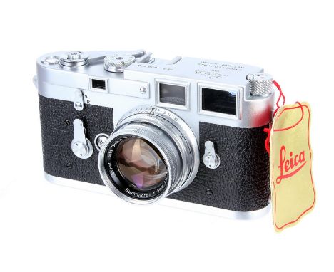 A Leica M3 DS Rangefinder Camera, 1955, type II, chrome, serial no. 806703, with Leitz Summicron f/2 50mm lens, 1954, chrome,