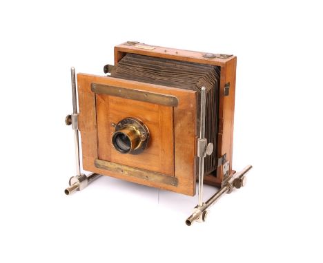 An Unmarked French Bi-Rail Mahogany Camera, 5x7”, with 13 x 18 Extra Rapide brass lens, in shutter, serial no. 28842, body, G