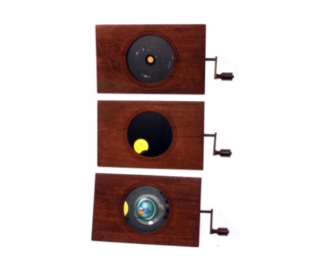 Mahogany-mounted Magic Lantern Slides: John Browning, London, solar system rotary slides, each with handwritten notation to o
