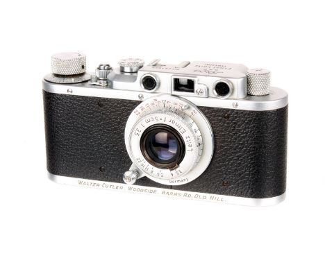 A Leica II Rangefinder Camera, 1937/38, chrome, serial no. 241656, with Leitz Elmar f/3.5 50mm lens, 1953, red dial, chrome, 