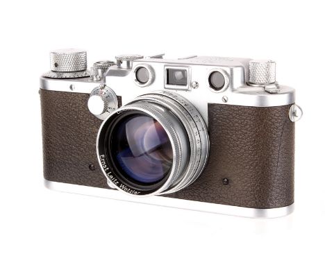 A Leica IIIc Rangefinder Camera, 1946/47, chrome, serial no. 435162, with Leitz Summitar f/2 50mm lens, 1948, chrome, serial 