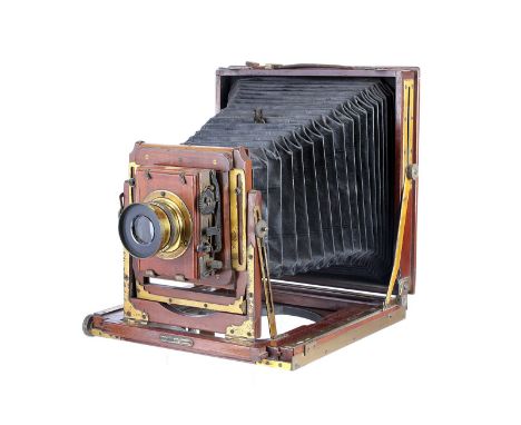 A National Camera Mahogany Field Camera, triple extension with revolving back, 4½x6¼”, with Beck Symmetrical f/8 brass lens, 