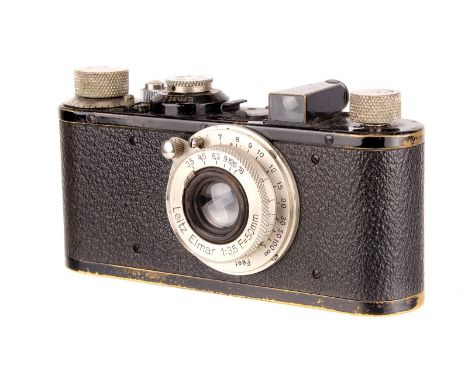 A Leica Ic Camera, 1931, black, serial no. 65663, with Leitz Elmar f/3.5 50mm lens, nickel, body, F, shutter working, lens, G