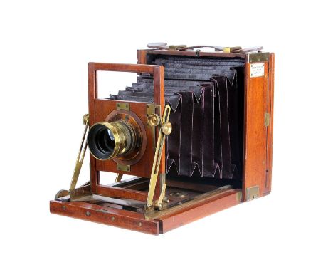 A Henry Crouch Mahogany Field Camera, with rear folding bed, 4½x6¼”, with unmarked f/8 brass lens, body, G, lens, G-VG, some 