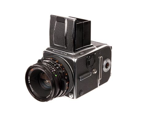 A Hasselblad 503CX Camera, chrome, serial no. 11EV14593, with Carl Zeiss CF Planar T* f/2.8 80mm lens, black, serial no. 7174