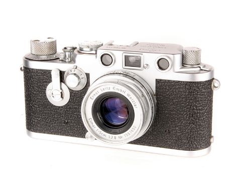 A Leica IIIf Red Dial Delay Rangefinder Camera, 1955, chrome, serial no. 790345, with Leitz Elmar f/2.8 50mm lens, 1958, chro