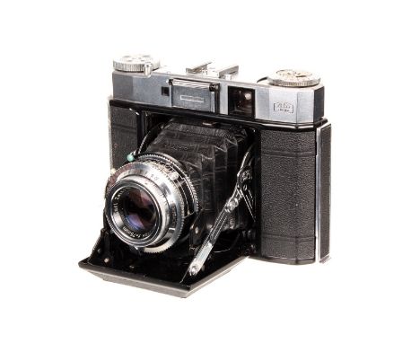 A Zeiss Ikon Super Ikonta 534/16 Camera, chrome, with Carl Zeiss Tessar f/3.5 75mm lens, serial no. 1304666, body, VG, shutte