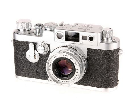 A Leica IIIg Rangefinder Camera, 1960, chrome, serial no. 987847, with Leitz Elmar f/2.8 50mm lens, 1958, chrome, serial no. 