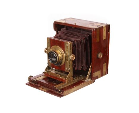 An Unmarked Mahogany Quarter-Plate Camera, 3x4”, with unmarked f/16 rotary Waterhouse-stop brass lens, body, P-G, back sectio